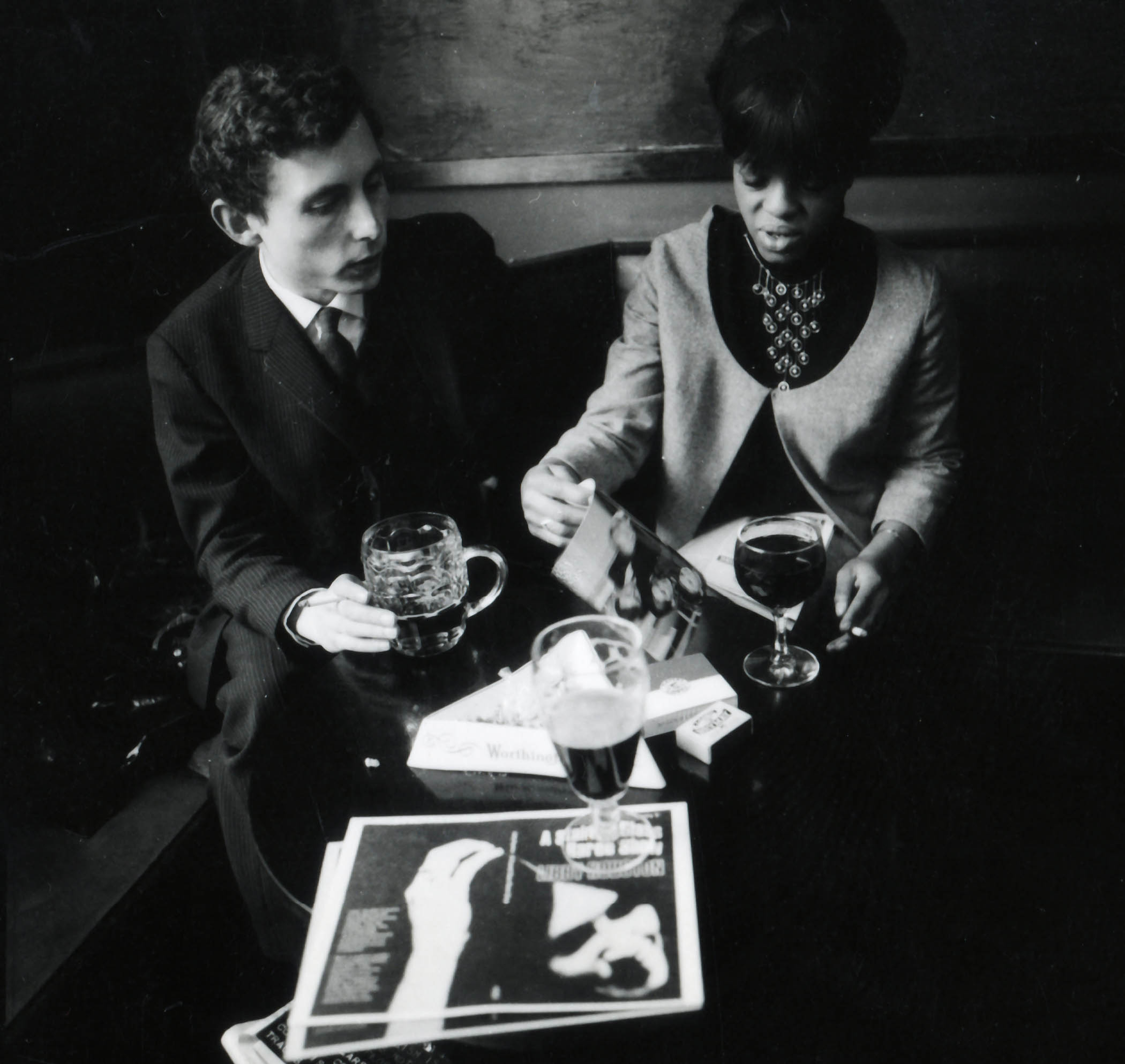 Above: Margaret Busby and Clive Allison enjoying a liquid lunch in 1967; main picture: Busby at work in 1971.