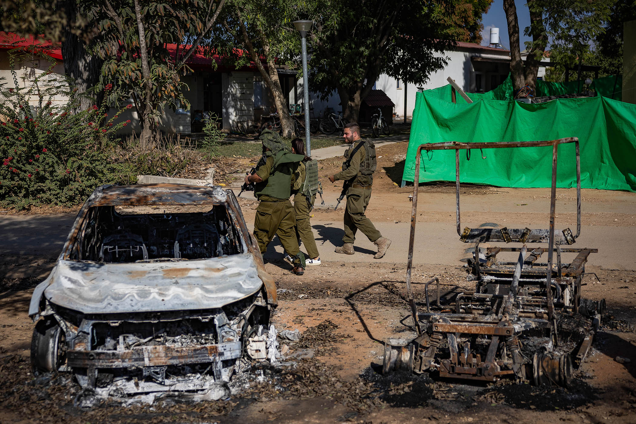 The aftermath of Hamas’s attack on the Nahal Oz kibbutz where Tibon lived with his wife and two daughters