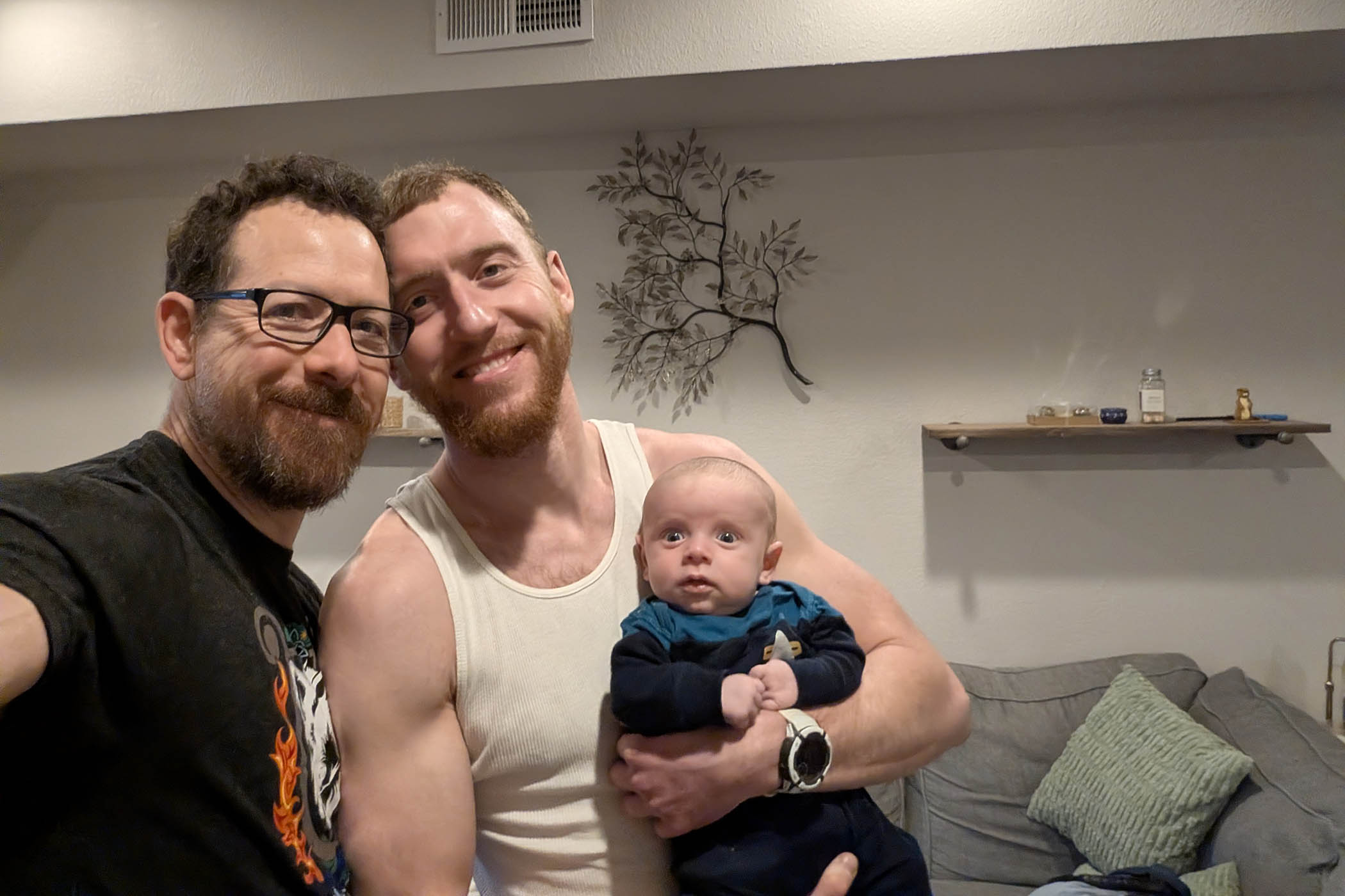 Arthur Zey, left, Chase Popp and their son, Dax. The couple paid $50,000 for PGT-P before selecting their ‘best’ embryo