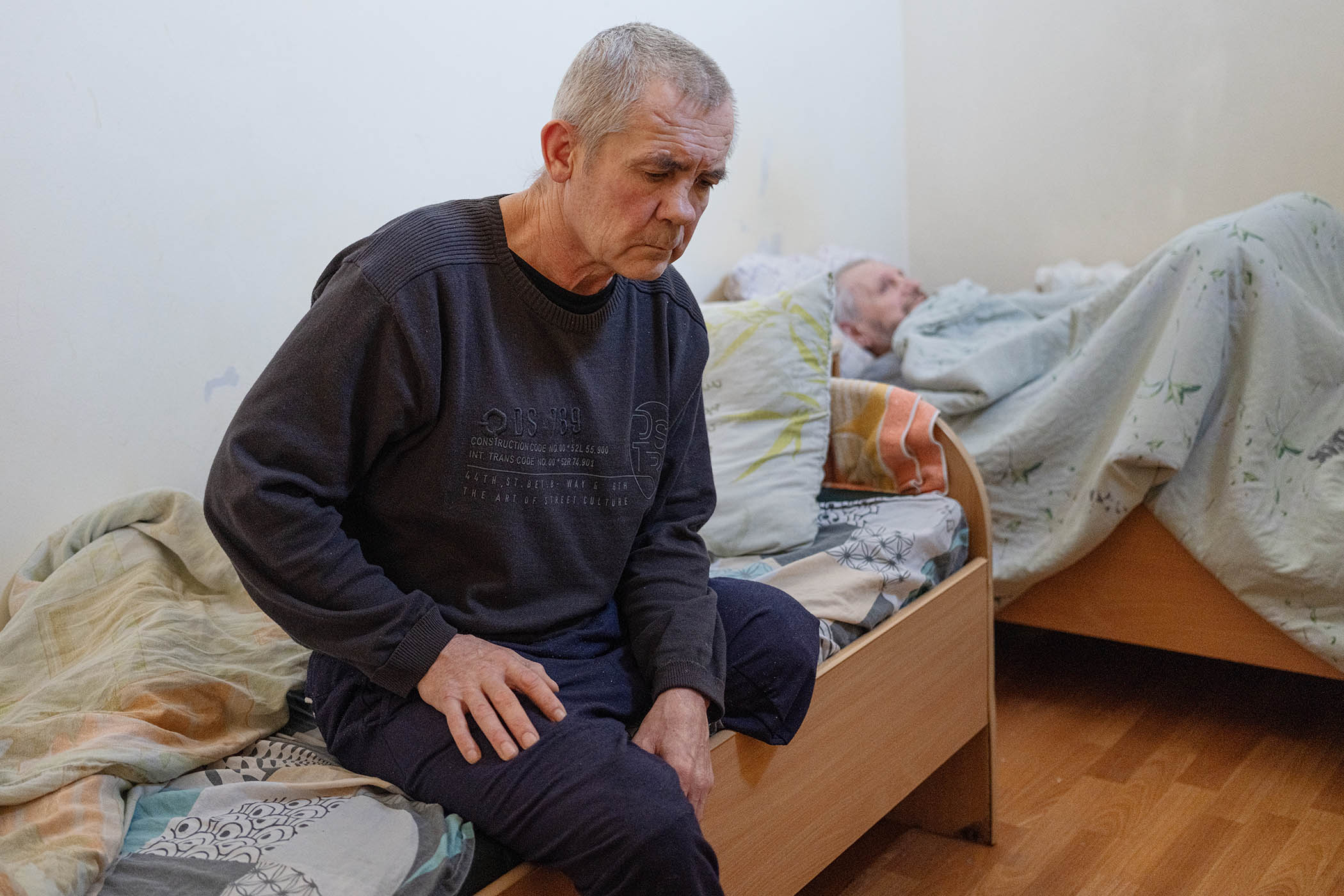 Volodymyr Baidarov, 53, had a leg amputated after stepping on a landmine. He now lives at Luchansky ﻿hospital awaiting displaced person status after his home was destroyed
